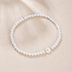 Pulsera blanca inicial i