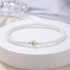 Pulsera blanca inicial k