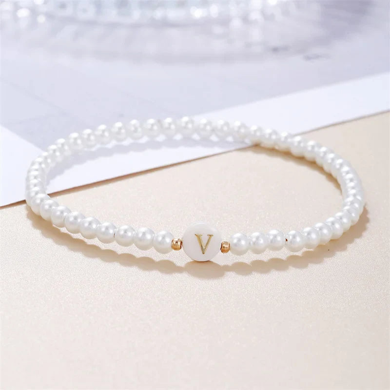 Pulsera blanca inicial v