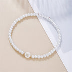 Pulsera blanca inicial w