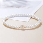 Pulsera blanca inicial - letra 