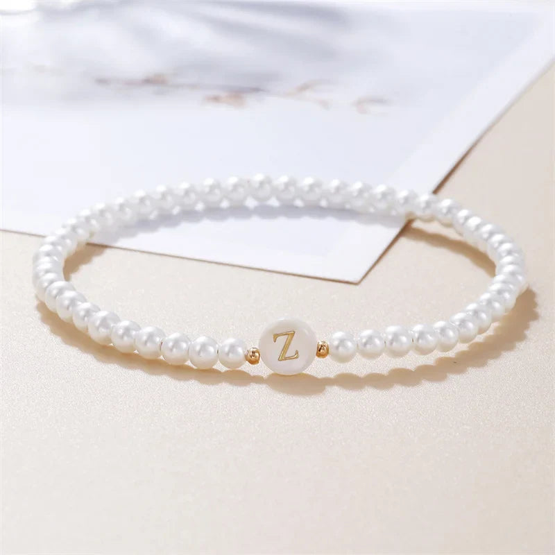Pulsera blanca inicial - letra 