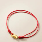 Pulsera budista con elefante rojo