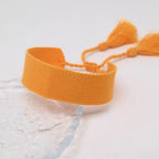 Pulsera brasileña pastel suave hecha a mano naranja