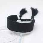 Pulsera brasileña pastel suave hecha a mano negra