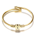 Pulsera corazón con inicial de oro k