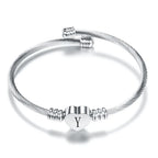 Pulsera corazón con inicial de plata y