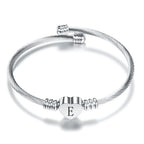 Pulsera corazón con inicial de plata e