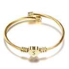 Pulsera corazón con inicial de oro s