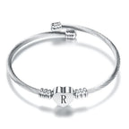 Pulsera corazón con inicial de plata r