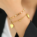 Pulsera Corazón Doble Mujer oro