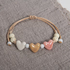 Pulsera corazón de cerámica beige