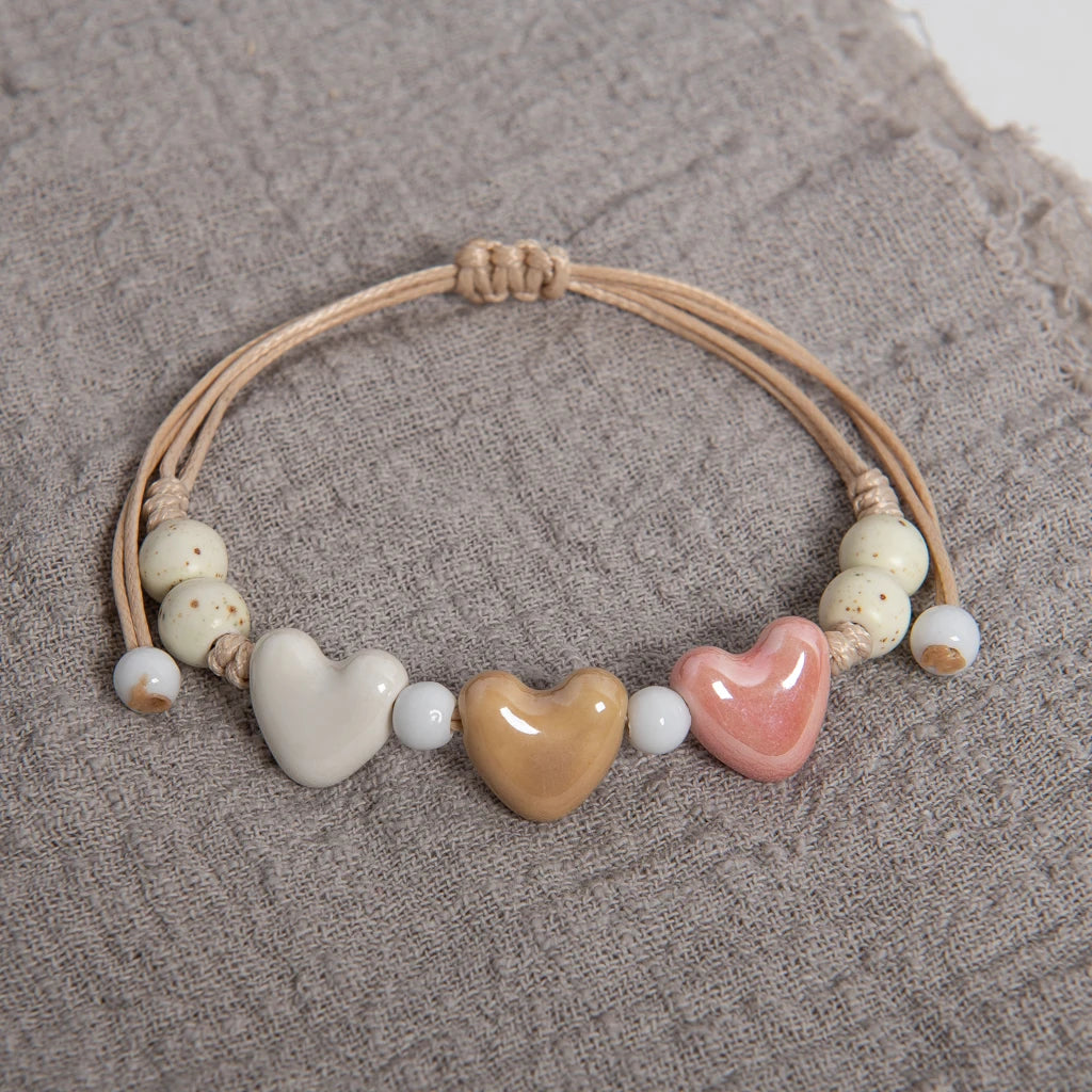 Pulsera corazón de cerámica beige