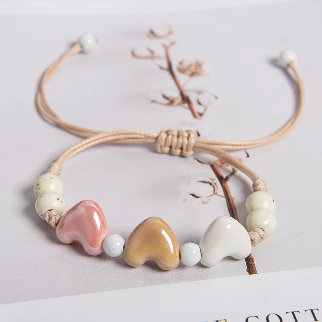 Pulsera corazón de cerámica beige