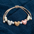 Pulsera corazón de cerámica beige