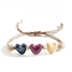 Pulsera corazón de cerámica violeta