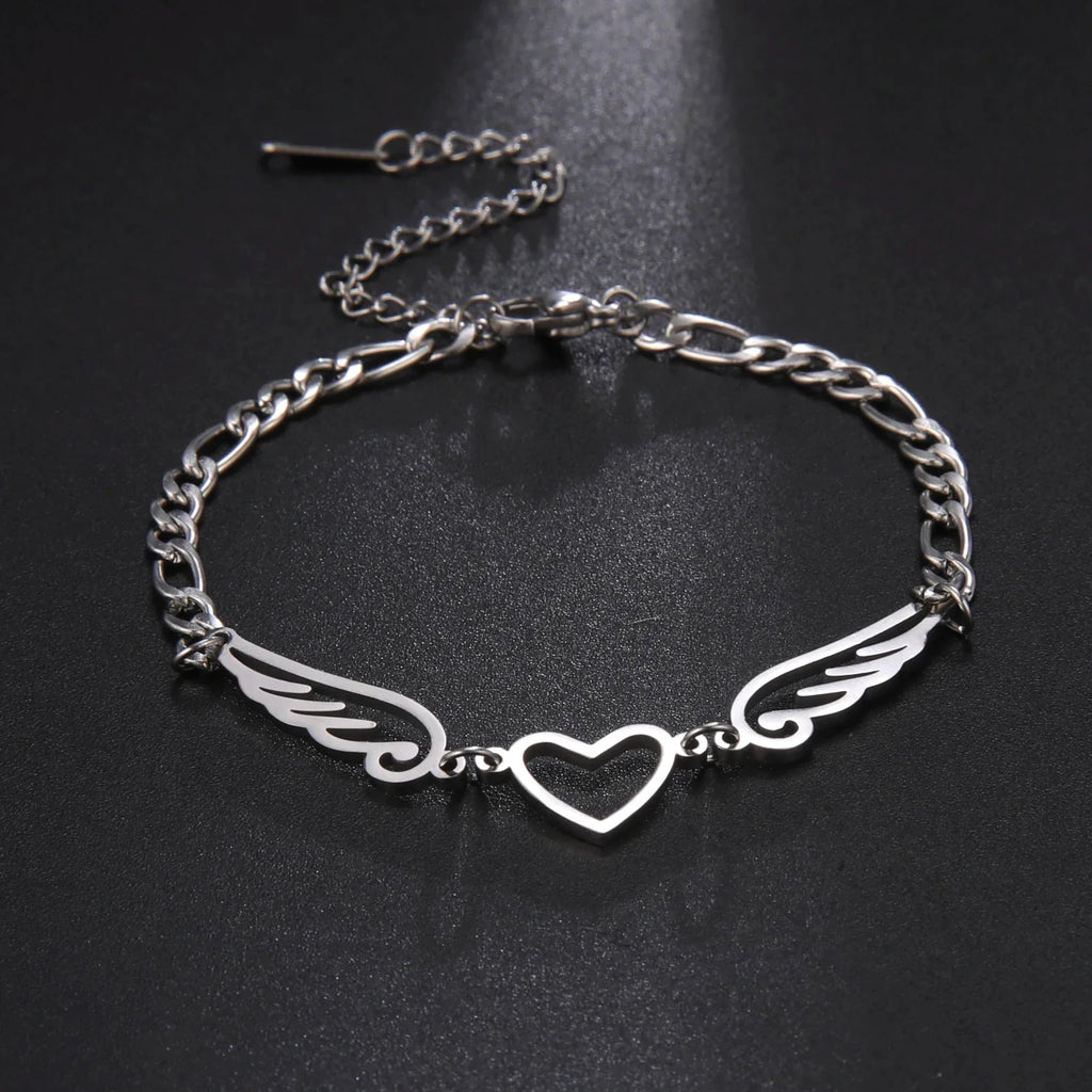 Pulsera corazón y alas de ángel plateado