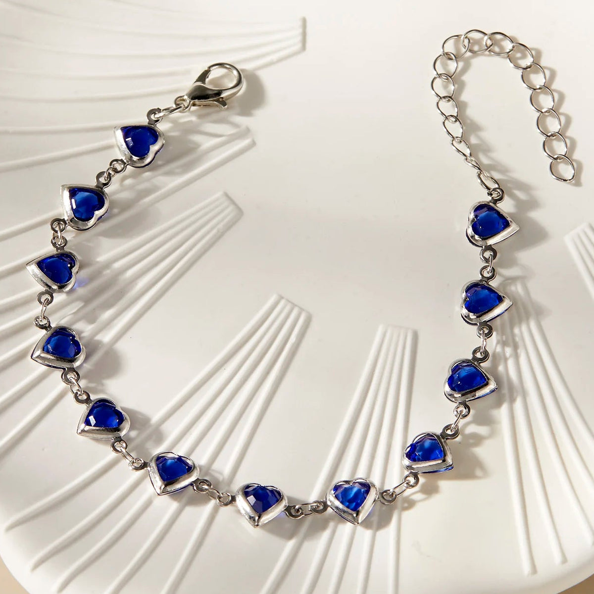 Pulsera de corazones esmaltados plateado y azul