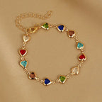 Pulsera de corazones esmaltados dorado y multicolor