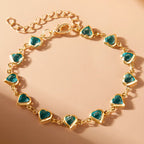 Pulsera de corazones esmaltados dorado y verde
