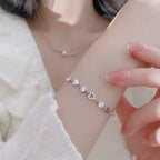 Pulsera corazones brillantes