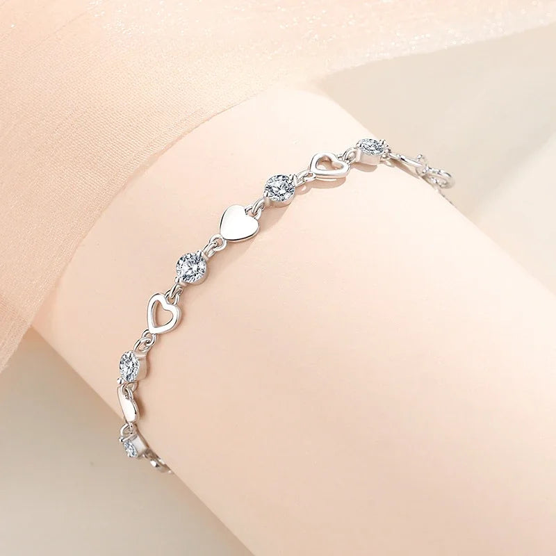 Pulsera corazones brillantes