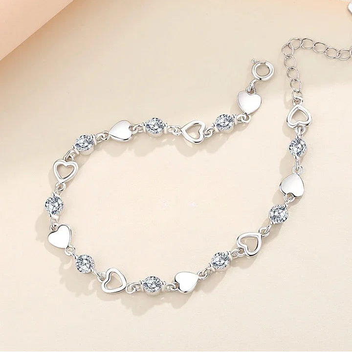 Pulsera corazones brillantes