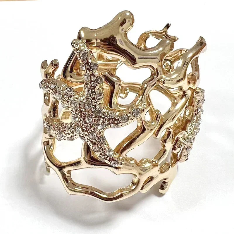 Pulsera Coral y Estrella de Mar dorada