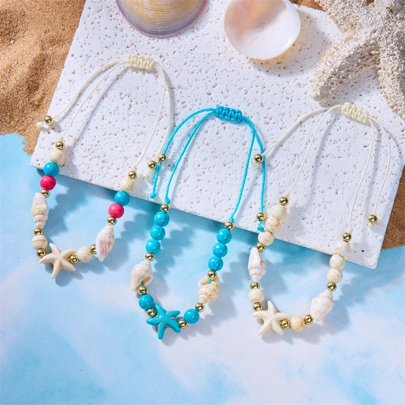 Pulsera de cordón con concha y estrella de mar blanca estrella