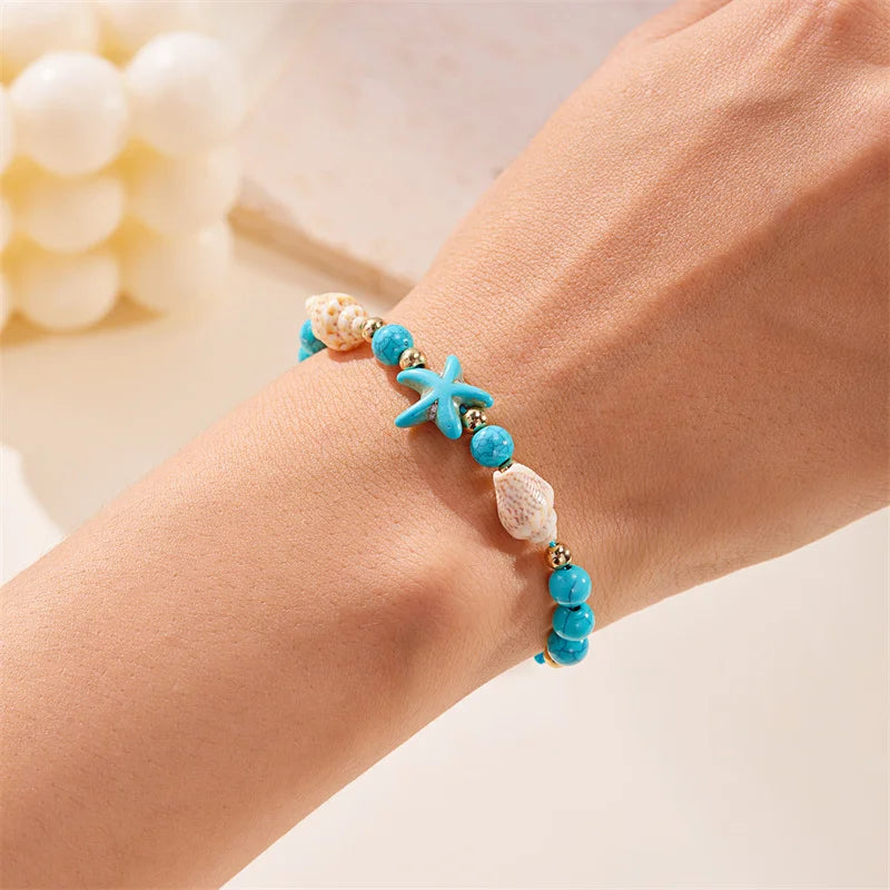 Pulsera de cordón con concha y estrella de mar azul estrella