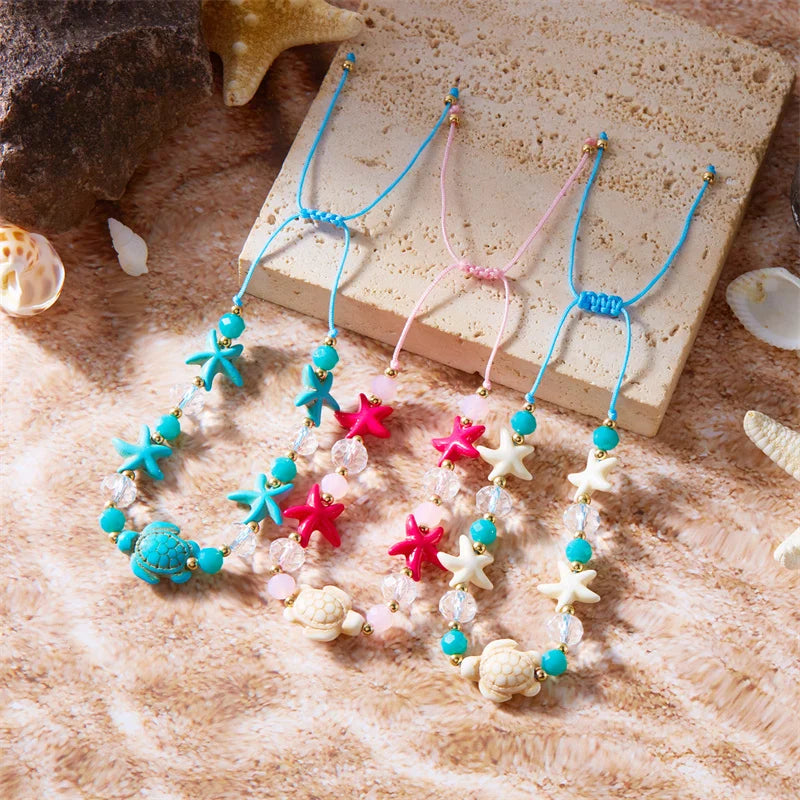 Pulsera de cordón con concha y estrella de mar azul tortuga