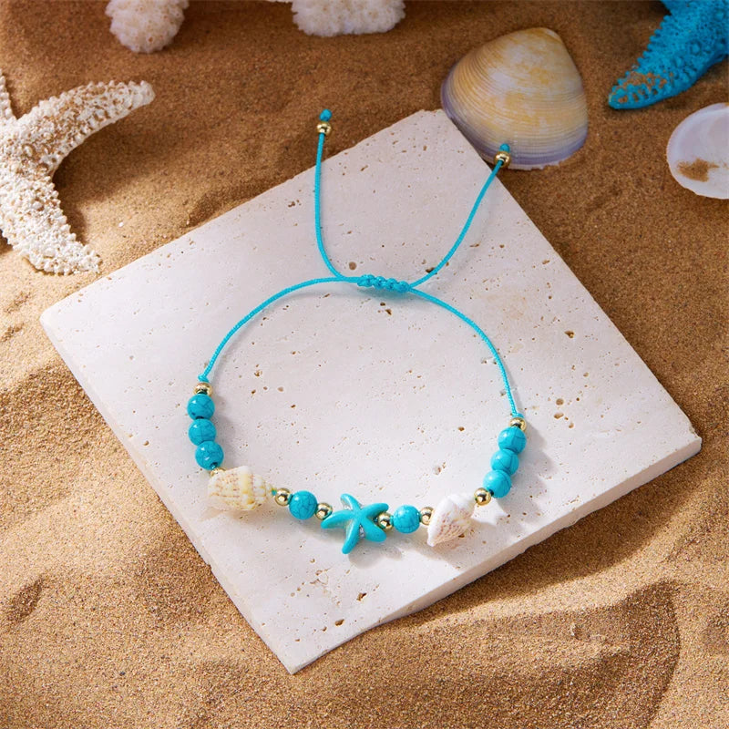 Pulsera de cordón con concha y estrella de mar azul estrella
