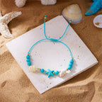 Pulsera de cordón con concha y estrella de mar azul estrella