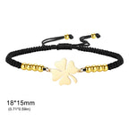 Pulsera de la amistad trébol de cuatro hojas negra y dorada