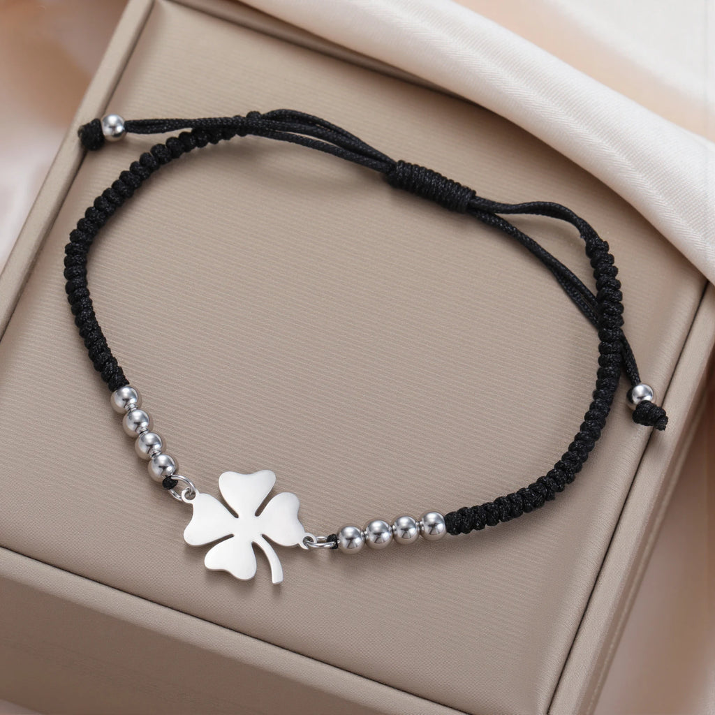 Pulsera de la amistad trébol de cuatro hojas negra y plateada
