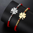 Pulsera de la amistad trébol de cuatro hojas roja y dorada