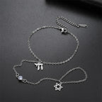 Pulsera de mano y dedo con colgantes de protección judíos Chai, <span data-glossary-id="etoile-de-david">estrella de David</span> y mano de Fátima Chai plata