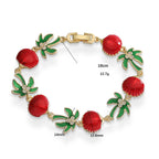 Pulsera de palmeras en esmalte verde y conchas rojas