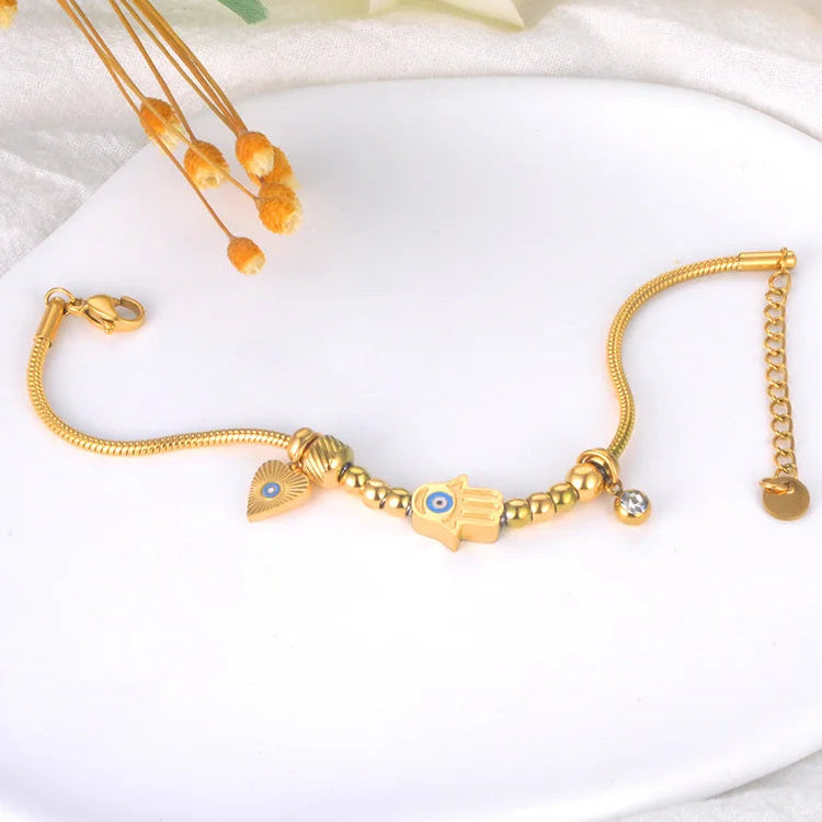 Pulsera de Protección con Mano de Fátima y Ojo Azul oro