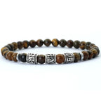 Buddhist protection bracelet in tiger's eye beads with engraved mantras