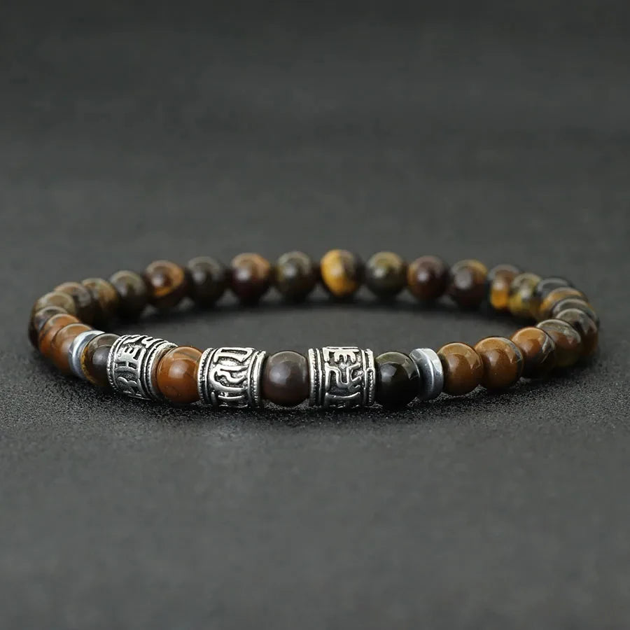 Buddhist protection bracelet in tiger's eye beads with engraved mantras