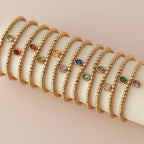 Pulsera dorada con piedra de nacimiento para mujer de enero