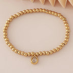 Pulsera dorada con piedra de nacimiento para mujer