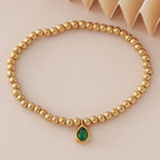 Pulsera dorada con piedra de nacimiento para mujer