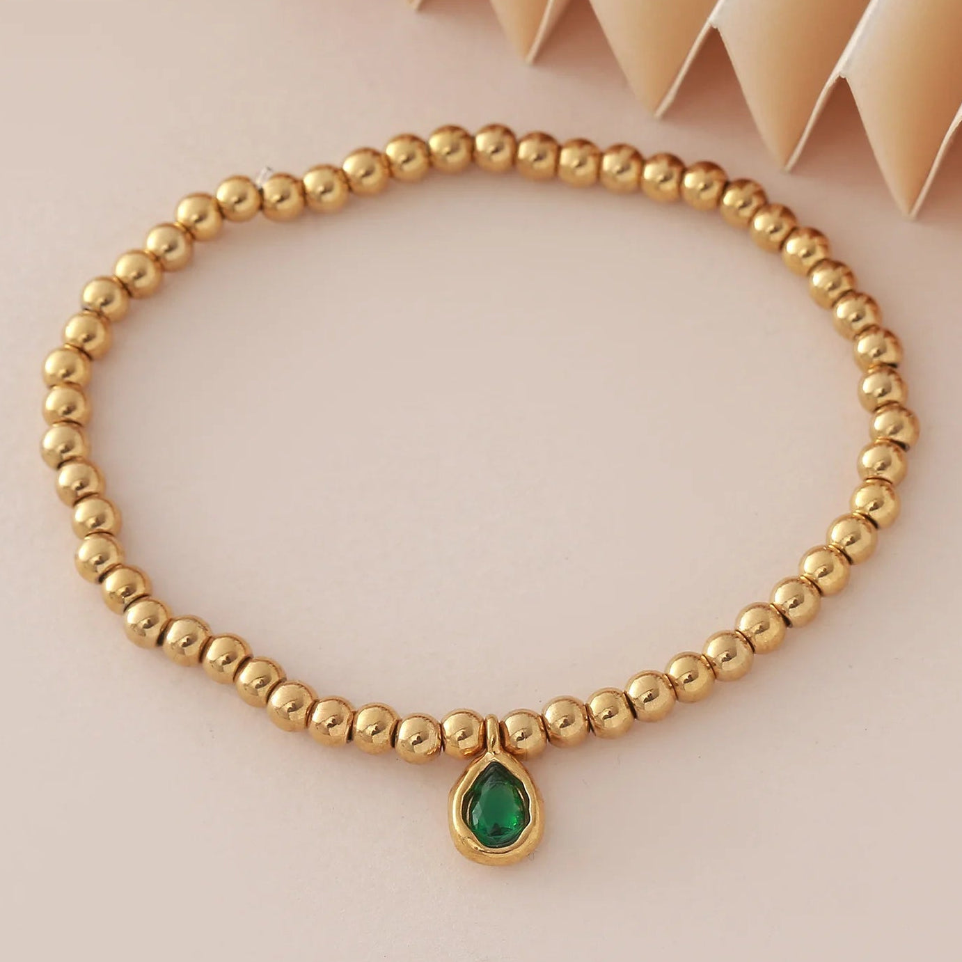 Pulsera dorada con piedra de nacimiento para mujer