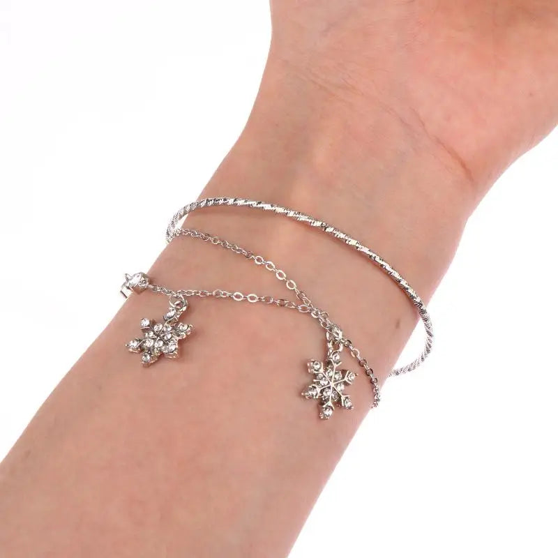 Pulsera doble con copos de nieve de cristal