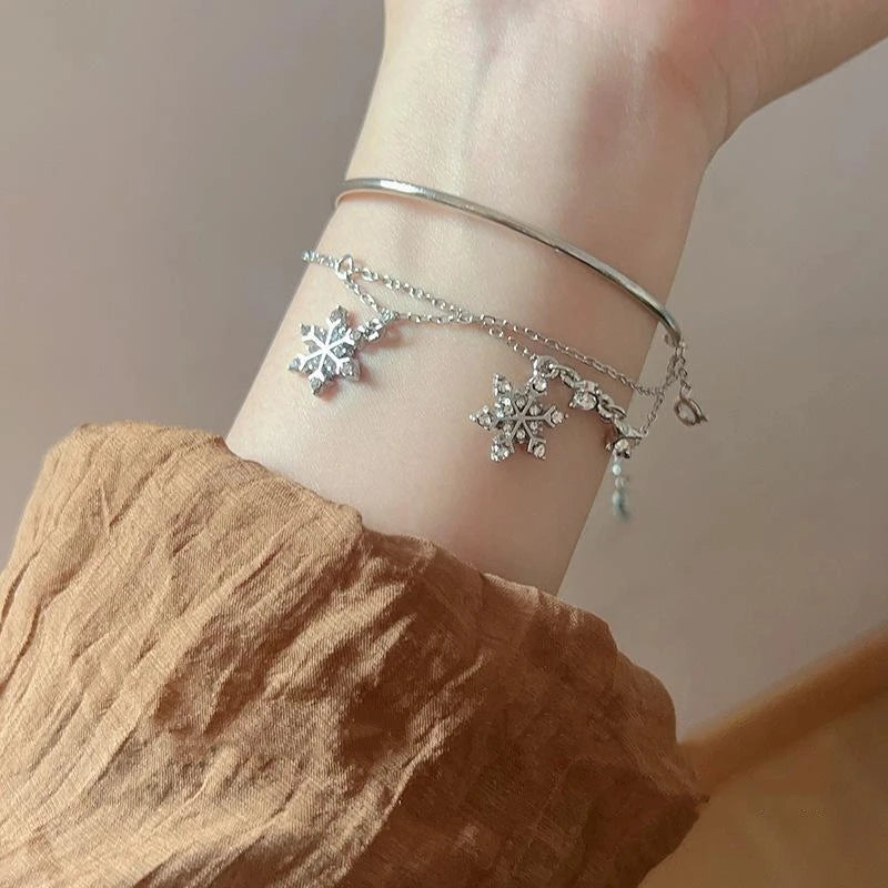 Pulsera doble con copos de nieve de cristal