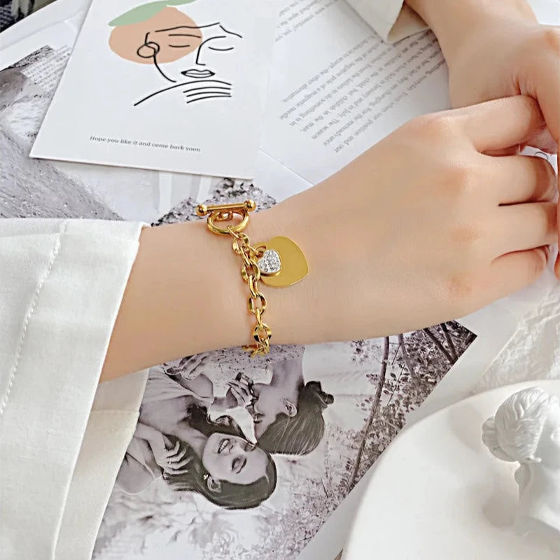 Pulsera Doble Corazón Gourmette Mujer oro