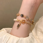 Pulsera Doble de Perlas