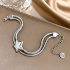 Pulsera de doble vuelta y estrella abombada de plata